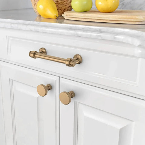 Champagne Bronze Cabinet Pulls 10 Pack With 3.75 Inch Hole Centers Durable Solid Cabinet Handles installed on white kitchen drawers IH0005