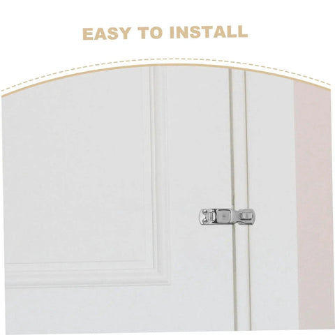 Marine-grade stainless steel boat door latch installed on a white door.