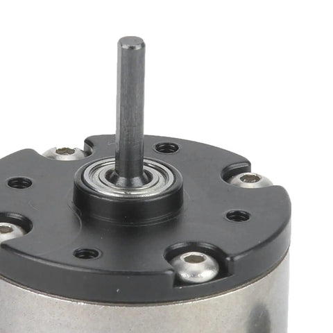 Close-up of planetary gearbox reduction motor output shaft for RC cars and trucks.