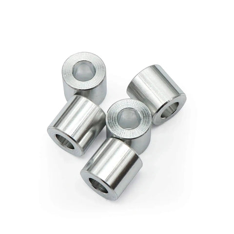 Four durable 6061 aluminum spacers with a half inch outer diameter, quarter inch inner bore, and half inch length for rotary applications.