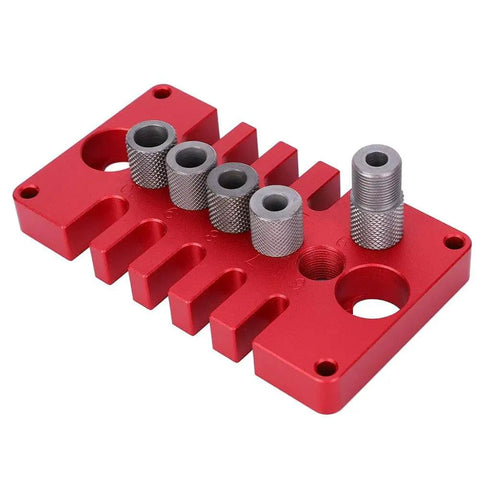 Red 3-In-1 Dowel Jig Drill Guide Block for Woodworking, Aluminum Alloy Hole Locator with bushings, angled view