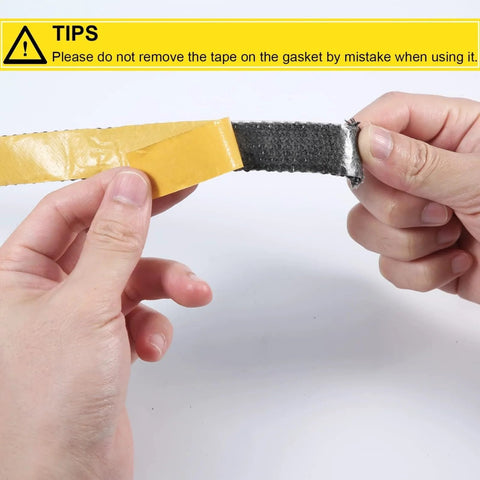 Flat self-adhesive fiberglass stove gasket tape with yellow protective backing being peeled away.