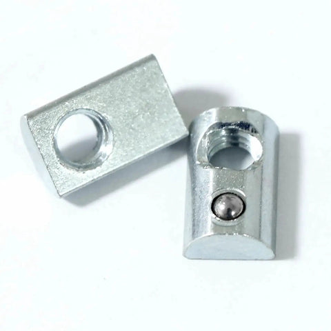 Close-up of 5/16-18 threaded steel Roll-In T-nut with ball spring, compatible with 15 and 40 series aluminum extrusion profiles, 20 pack