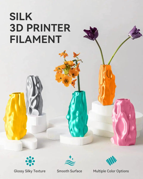 Colorful vases printed with Silk Silver PLA Filament 1.75mm 1Kg For Glossy Smooth Silk Finish, showcasing smooth finishes.