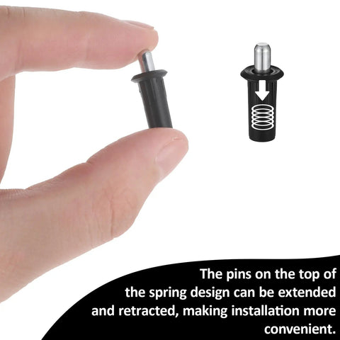 Close-up of hand holding a spring pin from the 8 Piece Cabinet Door Repair Pins Set For Damper Replacement And Furniture Fittings.