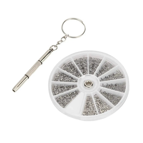 Round case with compartments showing assorted screws and a metal keychain tool from Screw Nut Assortment Kit With 600 Pieces Stainless Steel Mini Screws And Nuts, 12 Size Options, Pro Grade Fix Kit For Watches Glasses And Electronics Repair, Handy Small Fastener Set For Quick DIY Repairs.