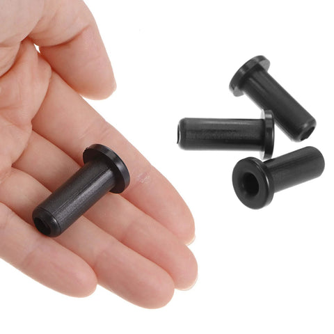 Four Pack Flanged Sleeve Bearings Nylon Bushings For Shaft 6mm Bore 10mm OD 28.5mm Length Self Lubricating Black With Good Load Capacity Wear Resistant No Oil Needed Ideal For RC Cars Drones And Small Machinery shown in hand for scale