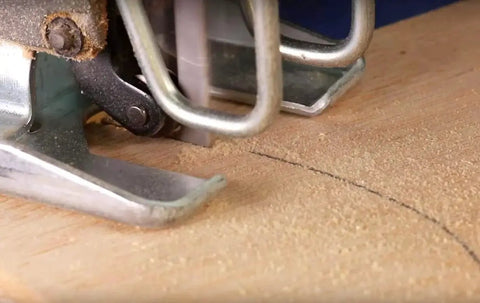 Close-up of jigsaw cutting wood, part of 50 Piece Jigsaw Blades Set With Storage Case For Wood Plastic And Metal Cutting Assorted T Shank Blades Includes T118A T118B T101AO T101B T101BR And T144D Heavy Duty Pro Level