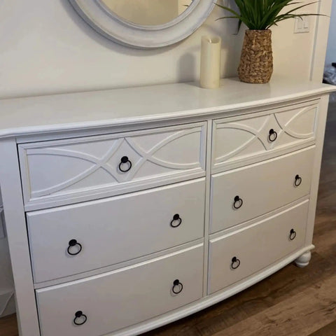 White dresser with Two Pack Black Iron Cabinet Ring Pulls with Screws in a Single Hole Design for kitchen cabinets and furniture.