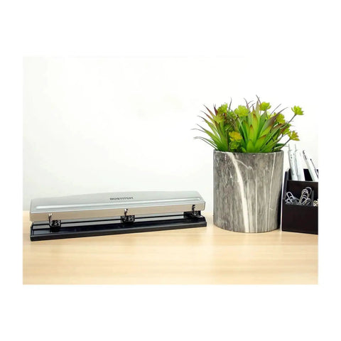 Rock Solid 3 Hole Punch For Office And Home Use With 12 Sheet Capacity, Metal Construction, Rubber Base, Sleek Silver Finish on desk