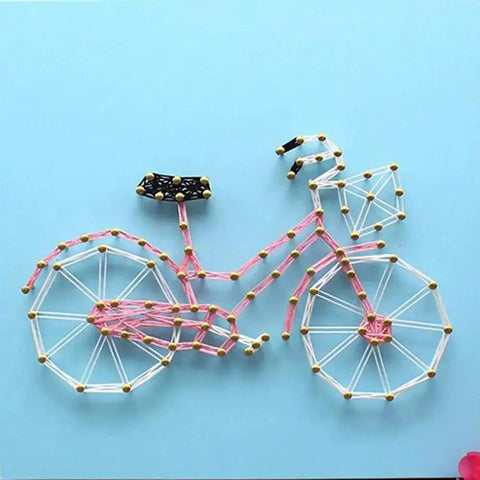 DIY bicycle art using 1600 Piece Tiny Nails Wood Screws Set For DIY Crafts Antique Finish in gold, silver, bronze on blue background.