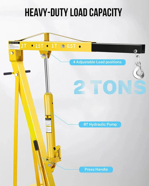 Front view of yellow 2-ton shop crane engine hoist with 6 steel casters and hydraulic pump