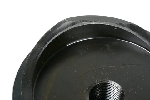Close-up of 3-1/2 Inch Deep Draw Conduit Punch Die for Hydraulic Knockout Driver, 13 Ton Punch, showing threaded center and metal edge.