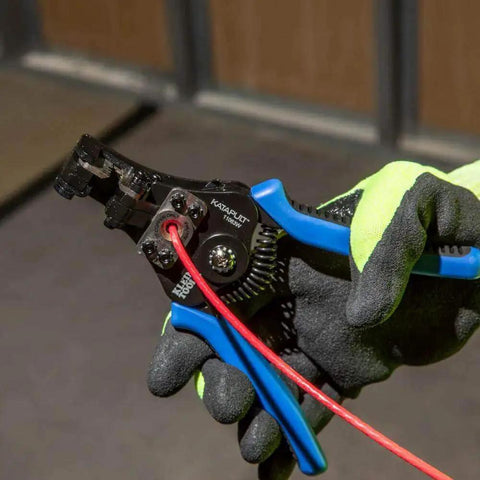 Heavy Duty Automatic Wire Cutter And Stripper For 8 To 20 AWG Solid And 10 To 22 AWG Stranded Wire being used on red wire