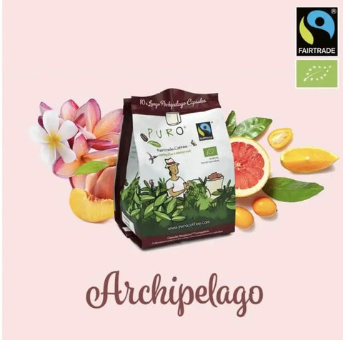 Fairtrade organic coffee bag with tropical fruits, plumeria flowers, and Fairtrade branding