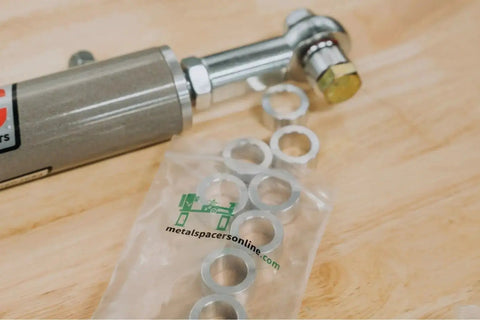 Aluminum Spacer 3/4 Inch Outer Diameter 5/16 Inch Inner Diameter Round Unthreaded Standoff Bushing Plain Finish Fits 5/16 Inch Or M8 Bolts Choose Your Length With 1 Inch Length Option Pack Of Ten next to cylinder.