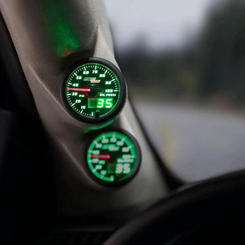 Double Vision 100 PSI Oil Pressure Gauge Kit With Electronic Sensor For Trucks, installed view showing green LED dial