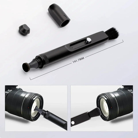 Double Ended Lens Cleaning Pen with Carbon Head and Soft Brush shown cleaning a camera lens