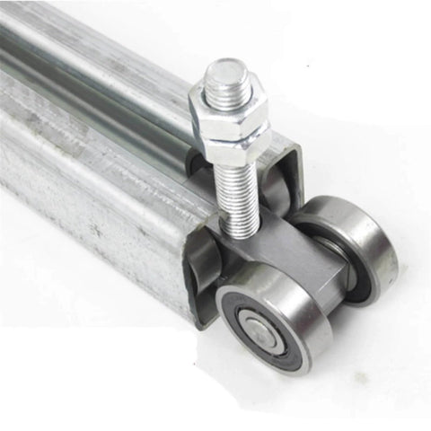 Close-up of Heavy Duty Sliding Door Hanging Wheel Set For Industrial Warehouse And Plant Use, showing orbital track bearing.