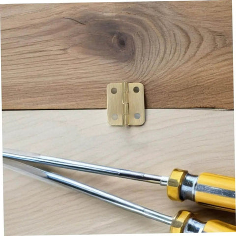 40Pcs Miniature Iron Cabinet Hinges With Screws for round corner jewelry boxes, shown with gold screwdriver on wood surface