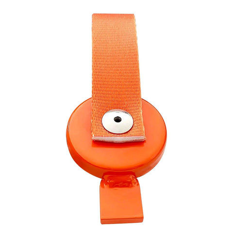 Orange round trailer brake lockout device with nylon strap and metal snap rivet