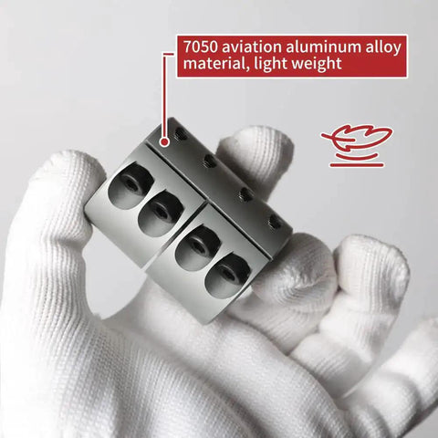 Close-up of a white-gloved hand holding a 7050 aluminum 14mm to 16mm shaft coupling, showing rigid clamp D32 L40 design for CNC machines.