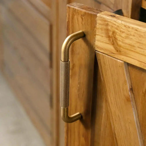 Six Pack 5 Inch Champagne Bronze Knurled Cabinet Pulls With Crosshatch Knurling on wooden cabinet door