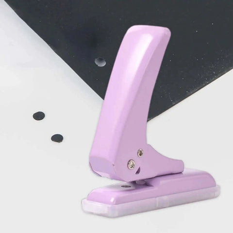 Pro Grade 40 Sheet Single Hole Punch With Non Slip Base 5.5mm Hole Adjustable Punch Position, purple tool on white background