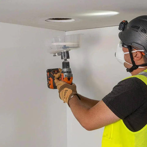 Person using Pro Grade Adjustable Hole Saw Cutter For Drywall And Ceiling Tiles With Dust Bowl And Vacuum Port, 2 To 7 Inches