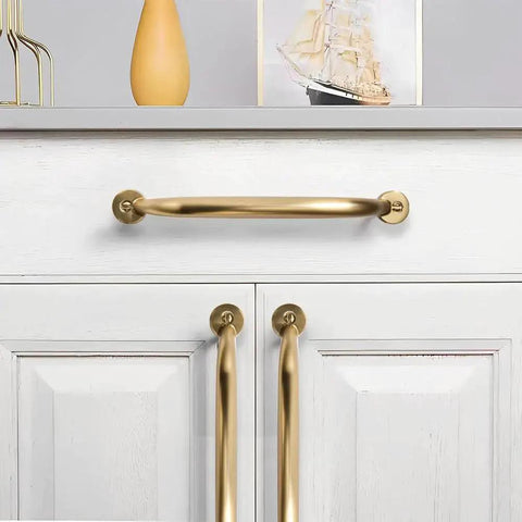 3 Inch Hole Center Brushed Brass Cabinet Pulls 10 Pack Heavy Duty Solid Drawer Handles installed on white kitchen cabinet