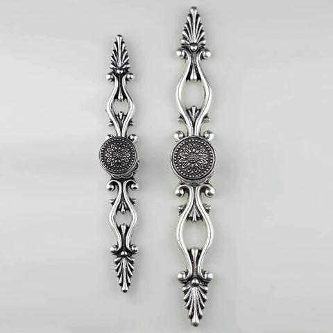 Vintage Sunflower Cabinet Knob With Back Plate Antique Silver And Black shown in both 1.02 and 1.26 inch sizes on plain background.