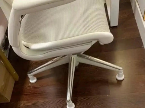 Office chair with Bell Glides High Profile 2.5 Inch 5 Pack White for carpet replacement, showing stationary castor installation.