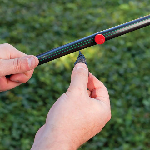 Rain Bird 1/2 in drip irrigation distribution tubing, black with green stripes, 100 ft roll