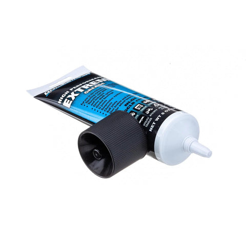 Quicksilver marine grease tube, 8 oz, black cap, white dispensing nozzle, blue and black label