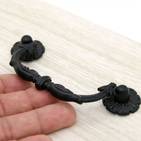 Close-up of one Six Pcs Vintage Black Drawer Pulls Handles Metal Bail Pulls, made of zinc alloy with an anti rust finish.