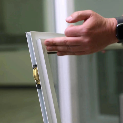 Sliding Patio Door Roller Assembly With 1-1/8 Inch Steel Wheel being installed, showing transition of frame and roller application.