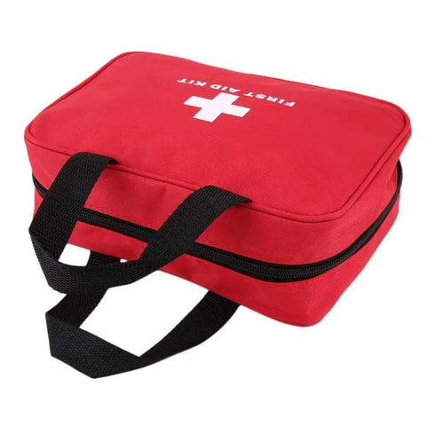 Red Empty First Aid Kit Bag For Travel And Home Lightweight Nylon Medical Organizer with handle, shown closed
