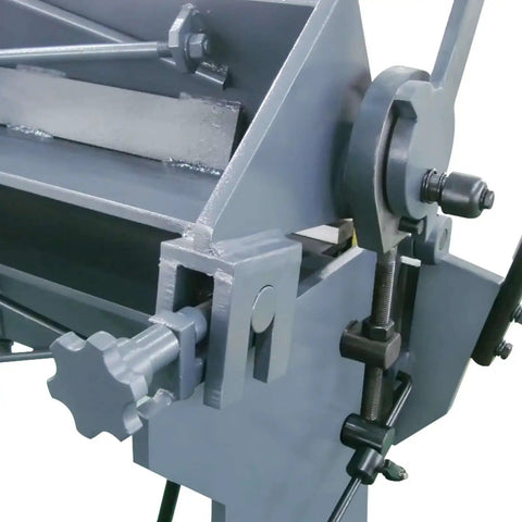 Close-up of 49 Inch Box And Pan Brake for Steel and Aluminum, showing adjustable clamp and lever, 12 gauge capacity up to 0.1 inch mild steel