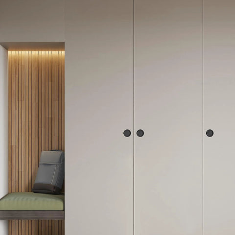 2 Pack Sliding Closet Door Finger Pulls Black Finish installed on white closet doors, no nails needed, fits two and one eighth inch holes.