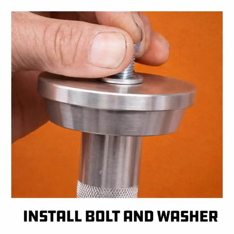 Close-up of a hand installing a bolt on the 10 Pc Master Bearing Race And Seal Driver Kit With 9 Precision Wheel Inserts