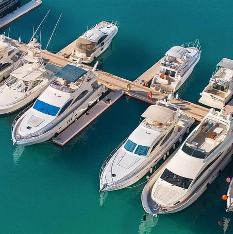 Marina with docked boats, suitable for use with Marine Grade Lubricant and Penetrating Oil for Boats and Gear NSF H1 Marine Formula.
