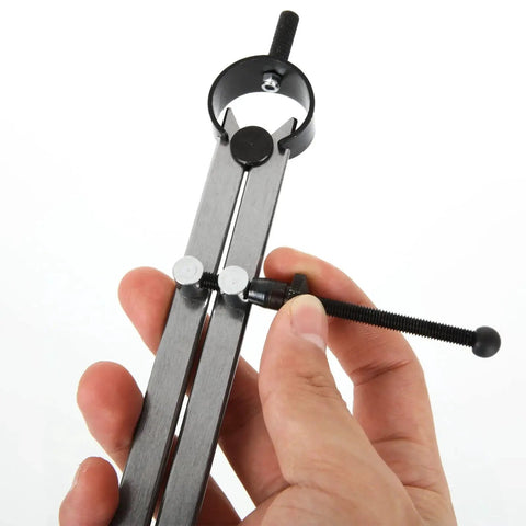 Close-up of hand holding the 3 Piece 8 Inch Spring Caliper And Divider Set For Woodworking Lathe Projects Includes Inside Caliper Outside Caliper And Divider Hardened Points For Precise Marking Fine Adjustment Carbon Steel Measuring Tools.