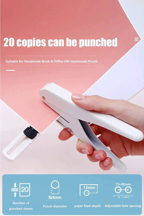 Handheld One Quarter Inch Hole Puncher With Skid Resistant Base, 20 Sheet Punch Capacity, demonstrated punching 20 pink paper sheets