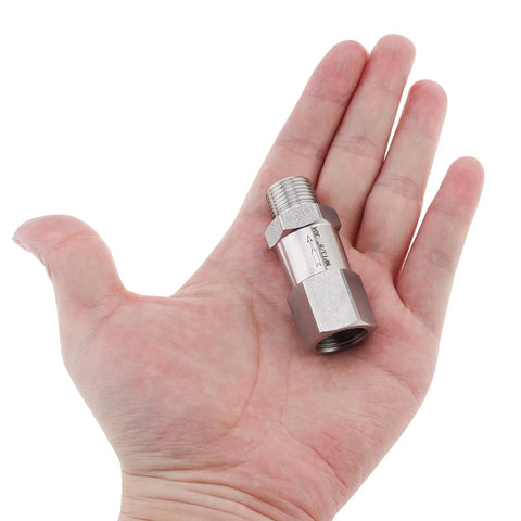 304 stainless steel check valve, 3/8 in NPT male x female, held in hand.