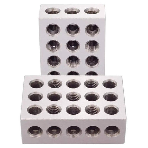Machinist Grade 1 By 2 By 3 Hardened Steel Block Set Matched Pair With 23 Holes Including Five Tapped Three Eighths Inch By Sixteen TPI Holes And Eighteen Plain Holes Precision Ground On All Sides For Setups Layout And Inspection In Milling displayed side by side.