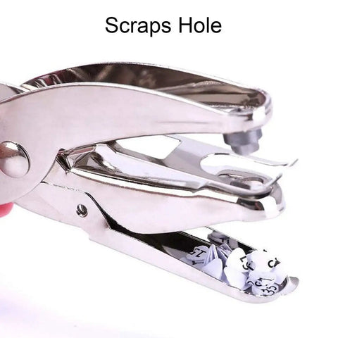 Close-up of metal circle hole punch with scrap catch cage for DIY crafts, featuring two sizes: 1/16 and 1/8 inch holes.
