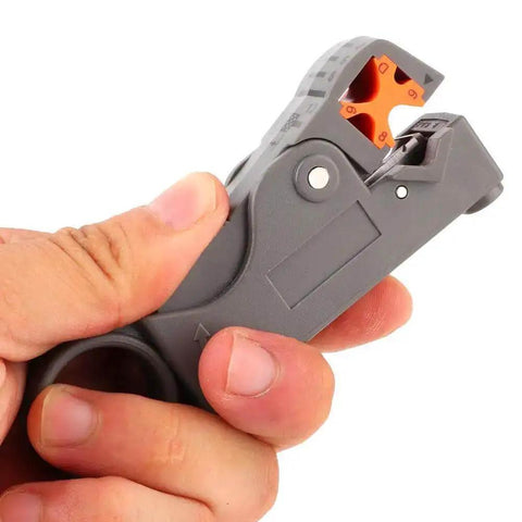 Hand holding Coaxial Cable Stripping And Crimping Tool With Adjustable Two Blade Knife, Compatible With 4 5 6 And 7 Coax Cables