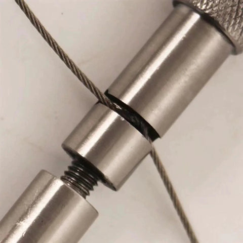 Manual Camping Rope And Dehorning Wire Tool for Animal Handling, close-up of stainless steel wire and handle connection.