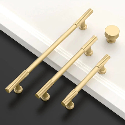 10 Pack 5 Inch Brushed Gold Cabinet Pulls For Kitchen Cabinets And Cupboards, Durable Metal Handles Displayed on Black and White Surface