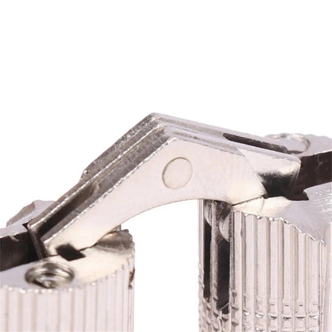 Close-up of Four Pack Brass Barrel Hidden Hinges for Concealed Cabinet Doors with 180 Degree Swing, solid brass